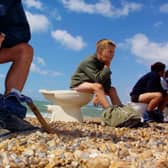 Members of Surfers Against Sewage hold a “toilet protest” August 8, 2001