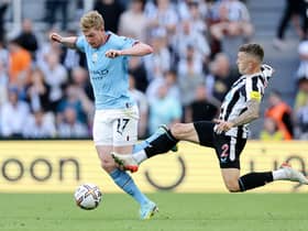 De Bruyne was furious with this challenge from Trippier. Credit: Getty.