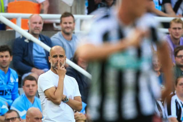 Manchester City boss Pep Guardiola. (Photo by LINDSEY PARNABY/AFP via Getty Images)