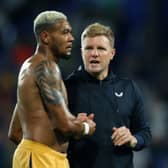 Head coach Eddie Howe, manager of Newcastle United, shakes hands with Joelinton after the Carabao Cup Second Round match between Tranmere Rovers and Newcastle United at Prenton Park on August 24, 2022 in Birkenhead, England.