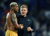 Head coach Eddie Howe, manager of Newcastle United, shakes hands with Joelinton after the Carabao Cup Second Round match between Tranmere Rovers and Newcastle United at Prenton Park on August 24, 2022 in Birkenhead, England.