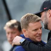 Eddie Howe, Manager of Newcastle United embraces Liverpool manager Jurgen Klopp (Photo by Ian MacNicol/Getty Images)