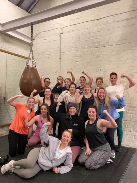 Karleigh with a group at KW Fitness