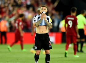 Kieran Trippier of Newcastle United dejected at the end of the defeat at Liverpool FC (Photo by Andrew Powell/Liverpool FC via Getty Images)