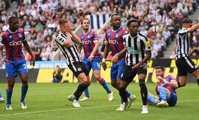Newcastle player Sven Botman holds his head in despair after a near miss during the Premier League match between Newcastle United and Crystal Palace at St. James Park on September 03, 2022 in Newcastle upon Tyne, England.