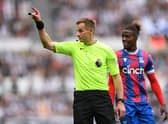Referee Michael Salisbury makes a decision during the Premier League match between Newcastle United and Crystal Palace  (Photo by Stu Forster/Getty Images)