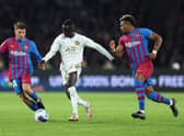 Garang Kuol of the All Stars takes on Adama Traore of FC Barcelona (Photo by Mark Metcalfe/Getty Images)