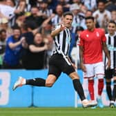 Fabian Schar of Newcastle United celebrates scoring their side’s first goal against Nottingham Forest (Photo by Stu Forster/Getty Images)