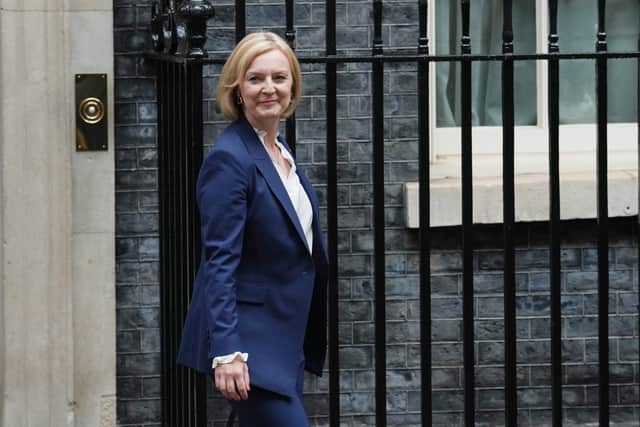 Prime Minister Liz Truss leaves 10 Downing Street to attend her first Prime Minister's Questions