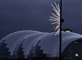 Christmas decorations hang from lamposts on Newcastle quayside