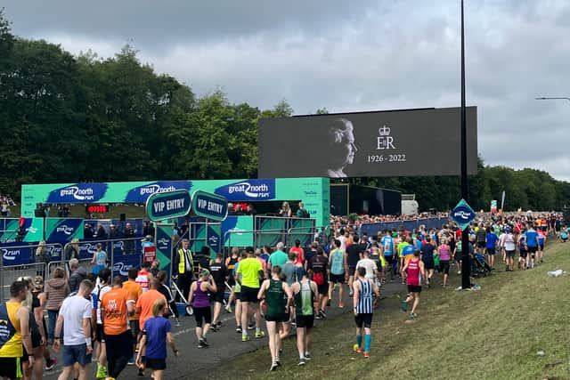 An image of Queen Elizabeth II over the Great North Run 2022 start line