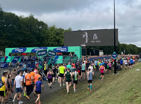 An image of Queen Elizabeth II over the Great North Run 2022 start line