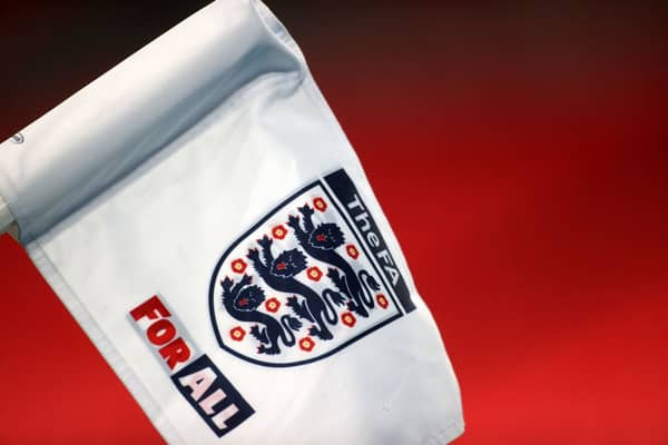 The FA has given the go ahead for football to resume after mourning the passing Queen Elizabeth II. (Photo by CARL RECINE/POOL/AFP via Getty Images)