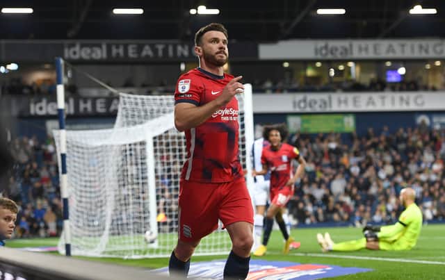 Scott Hogan of Birmingham City celebrates scoring his hat-trick and his sides third goal during the Sky Bet Championship between West Bromwich Albion and Birmingham City at The Hawthorns on September 14, 2022 in West Bromwich, England. (Photo by Tony Marshall/Getty Images)