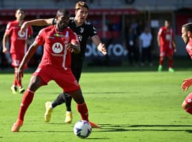 Monza’s Brazilian defender Marlon defends against Juventus’ Serbian forward Dusan Vlahovic (Photo by MIGUEL MEDINA/AFP via Getty Images)