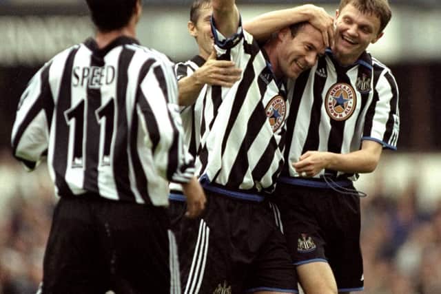 Alan Shearer is congratulated by Paul Robinson during the 8-0 win against Sheffield Wednesday (Photo: Clive Mason /Allsport)