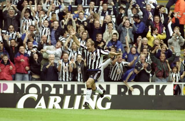 Alan Shearer of Newcastle salutes a goal during the Newcastle United v Sheffield Wednesday (Photo: Clive Mason /Allsport)