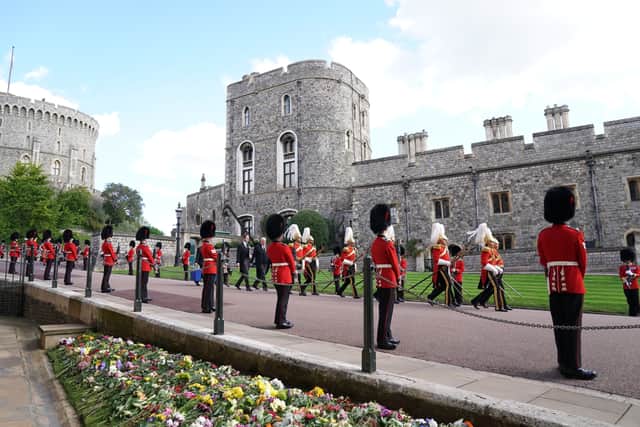 Soldiers from the Grenadier Guards at the Committal Service for Queen Elizabeth II held at St George’s Chapel in Windsor Castle, Berkshire. Picture date: Monday September 19, 2022.