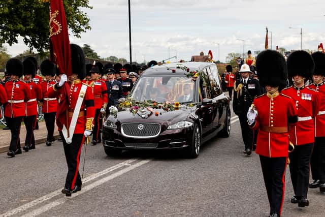 The Procession following the coffin of Queen Elizabeth II, aboard the State Hearse