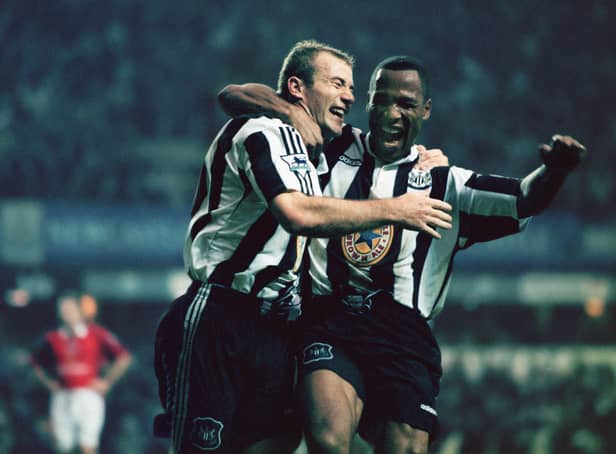 <p> Newcastle strikers Alan Shearer and Les Ferdinand celebrate a goal the 5-0 win against Manchester United in October 1996 (Photo by Ben Radford/Getty Images)</p>