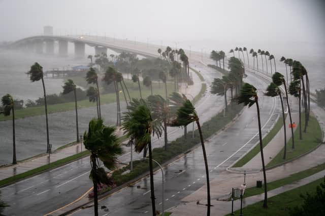 Wind gusts blow across Sarasota Bay as Hurricane Ian churns to the south of Florida