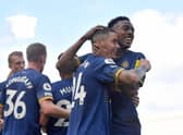 Miguel Almiron of Newcastle United celebrates after scoring their sides fourth goal during the Premier League match between Fulham FC and Newcastle United at Craven Cottage on October 01, 2022 in London, England.