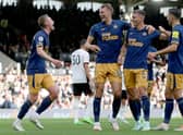 Newcastle United celebrate Sean Longstaff’s goal at Fulham. (Photo by Henry Browne/Getty Images)