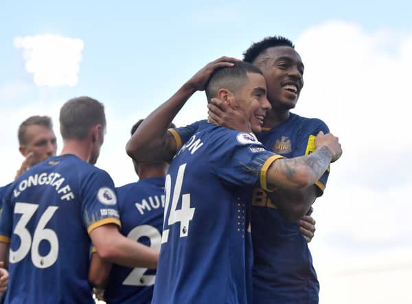 Newcastle United duo Miguel Almiron and Joe Willock. (Photo by Tom Dulat/Getty Images)