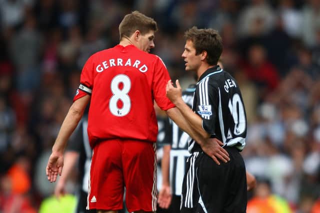 Michael Owen and Steven Gerrard at the end of the Premier League match between Liverpool and Newcastle United in May 2009 (Photo by Clive Brunskill/Getty Images)