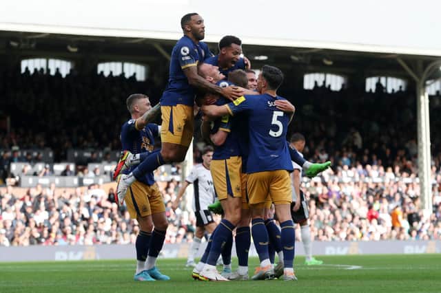 Newcastle United players celebrated Sean Longstaff’s goal at Fulham. (Photo by Henry Browne/Getty Images)
