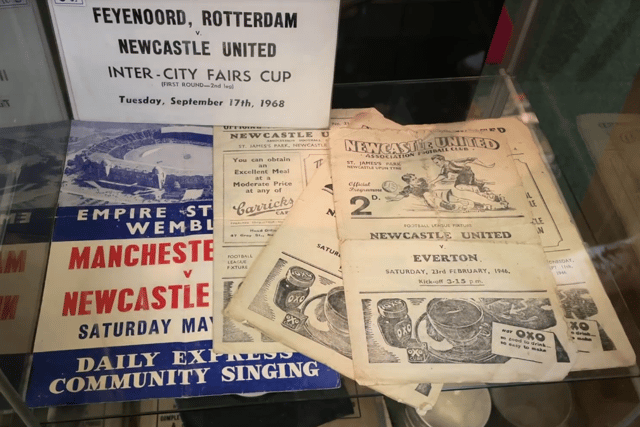 Old programmes on the shelves at The Back Page