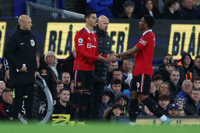Cristiano Ronaldo replaces Anthony Martial of Manchester United during the Premier League match between Everton FC and Manchester United. (Photo by Clive Brunskill/Getty Images)