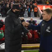 Liverpool boss Jurgen Klopp and Newcastle United head coach Eddie Howe. (Photo by Andrew Powell/Liverpool FC via Getty Images)