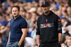 Frank Lampard and Jurgen Klopp look on during the Premier League match between Everton and Liverpool (Photo by Michael Regan/Getty Images)