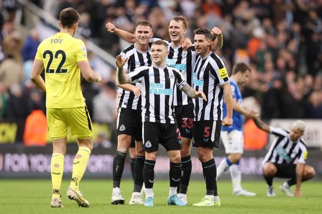 Nick Pope joins in with the celebrations as team mates Sven Botman, Kieran Trippier, Dan Burn and Fabian Schar after Newcastle United’s win against and Everton (Photo by George Wood/Getty Images)