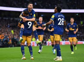 LONDON, ENGLAND - OCTOBER 23: Miguel Almiron celebrates with Callum Wilson of Newcastle United after scoring their team's second goal during the Premier League match between Tottenham Hotspur and Newcastle United at Tottenham Hotspur Stadium on October 23, 2022 in London, England. (Photo by Justin Setterfield/Getty Images)