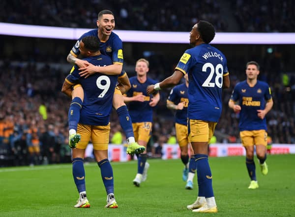 LONDON, ENGLAND - OCTOBER 23: Miguel Almiron celebrates with Callum Wilson of Newcastle United after scoring their team's second goal during the Premier League match between Tottenham Hotspur and Newcastle United at Tottenham Hotspur Stadium on October 23, 2022 in London, England. (Photo by Justin Setterfield/Getty Images)