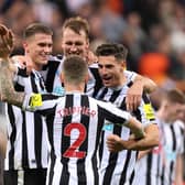 Sven Botman, Kieran Trippier, Dan Burn and Fabian Schar of Newcastle United celebrate their side’s win against Everton (Photo by George Wood/Getty Images)