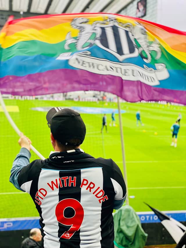 Ian with a Newcastle United Pride flag before the meeting with Villa (Image: United with Pride)