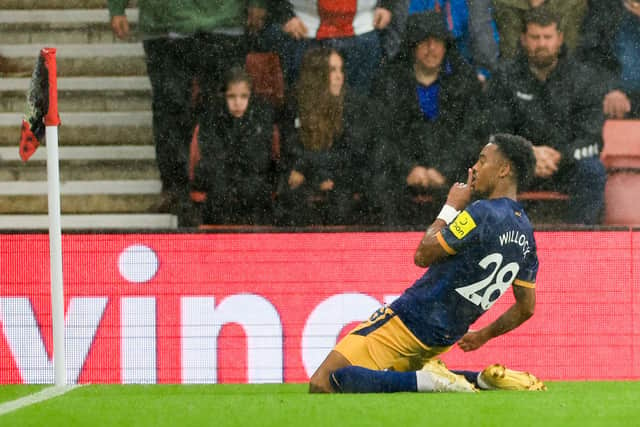 Joe Willock of Newcastle United celebrates after scoring their team’s third goal during the Premier League match between Southampton FC and Newcastle United at Friends Provident St. Mary’s Stadium on November 06, 2022 in Southampton, England.