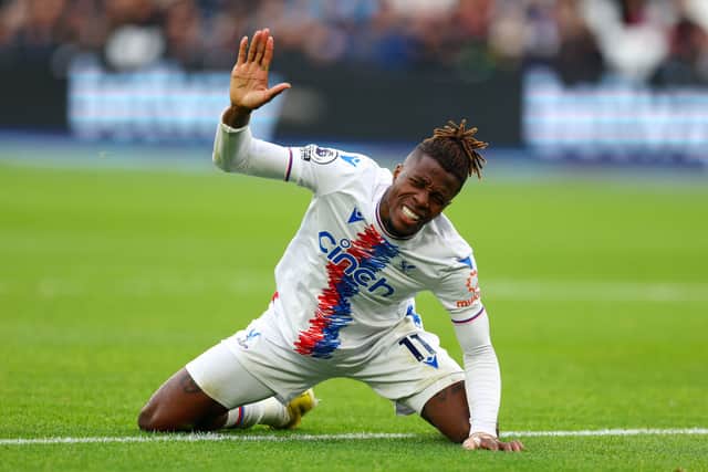 Wilfried Zaha of Crystal Palace reacts during the Premier League match between West Ham United and Crystal Palace at London Stadium on November 06, 2022 in London, England. 