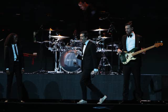 The 1975 are currently on tour in the US, seen here performing in 2019 (Image: Getty Images)