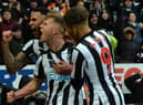 Matt Ritchie, Jamaal Lascelles and Dwight Gayle celebrate during Newcastle United’s win against Southampton in 2018 (Photo by Mark Runnacles/Getty Images)