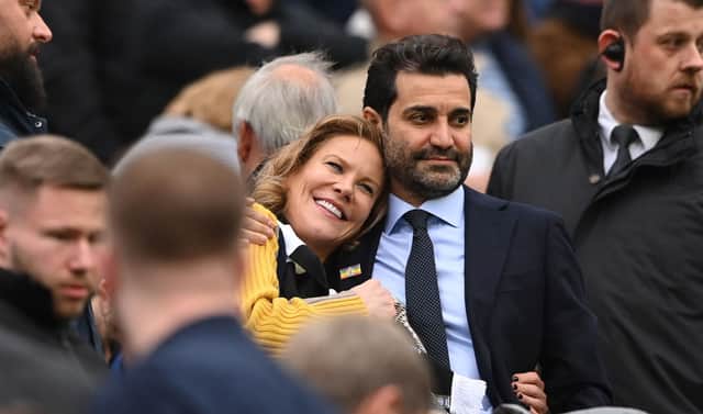 Newcastle United co-owners Amanda Staveley and husband Mehrdad Ghodoussi embrace as their Wedding anniversary is displayed on the big screen during the Premier League match between Newcastle United and Aston Villa at St. James Park on October 29, 2022 in Newcastle upon Tyne, England.