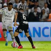 Angelo of Santos takes on Corinthians’ Lucas Piton (Photo by Ricardo Moreira/Getty Images)