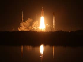 Artemis I Space Launch System (SLS) rocket, with the Orion capsule attached, launches at NASA's Kennedy Space Center on November 16