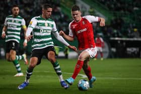 Sporting Braga forward Vitinha vies with Sporting’s Moroccan defender Zouhair Feddal (Photo by CARLOS COSTA / AFP) (Photo by CARLOS COSTA/AFP via Getty Images)