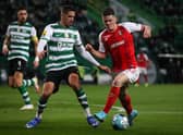 Sporting Braga forward Vitinha vies with Sporting’s Moroccan defender Zouhair Feddal (Photo by CARLOS COSTA / AFP) (Photo by CARLOS COSTA/AFP via Getty Images)