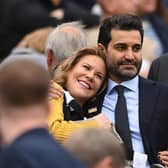 NEWCASTLE UPON TYNE, ENGLAND - OCTOBER 29: Newcastle United co-owners Amanda Staveley and husband Mehrdad Ghodoussi embrace as their Wedding anniversary is displayed on the big screen during the Premier League match between Newcastle United and Aston Villa at St. James Park on October 29, 2022 in Newcastle upon Tyne, England. (Photo by Stu Forster/Getty Images)