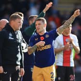 Kieran Trippier speaks to Eddie Howe, Manager of Newcastle United during the Premier League match between Southampton FC and Newcastle United at Friends Provident St. Mary’s Stadium on November 06, 2022 in Southampton, England. 